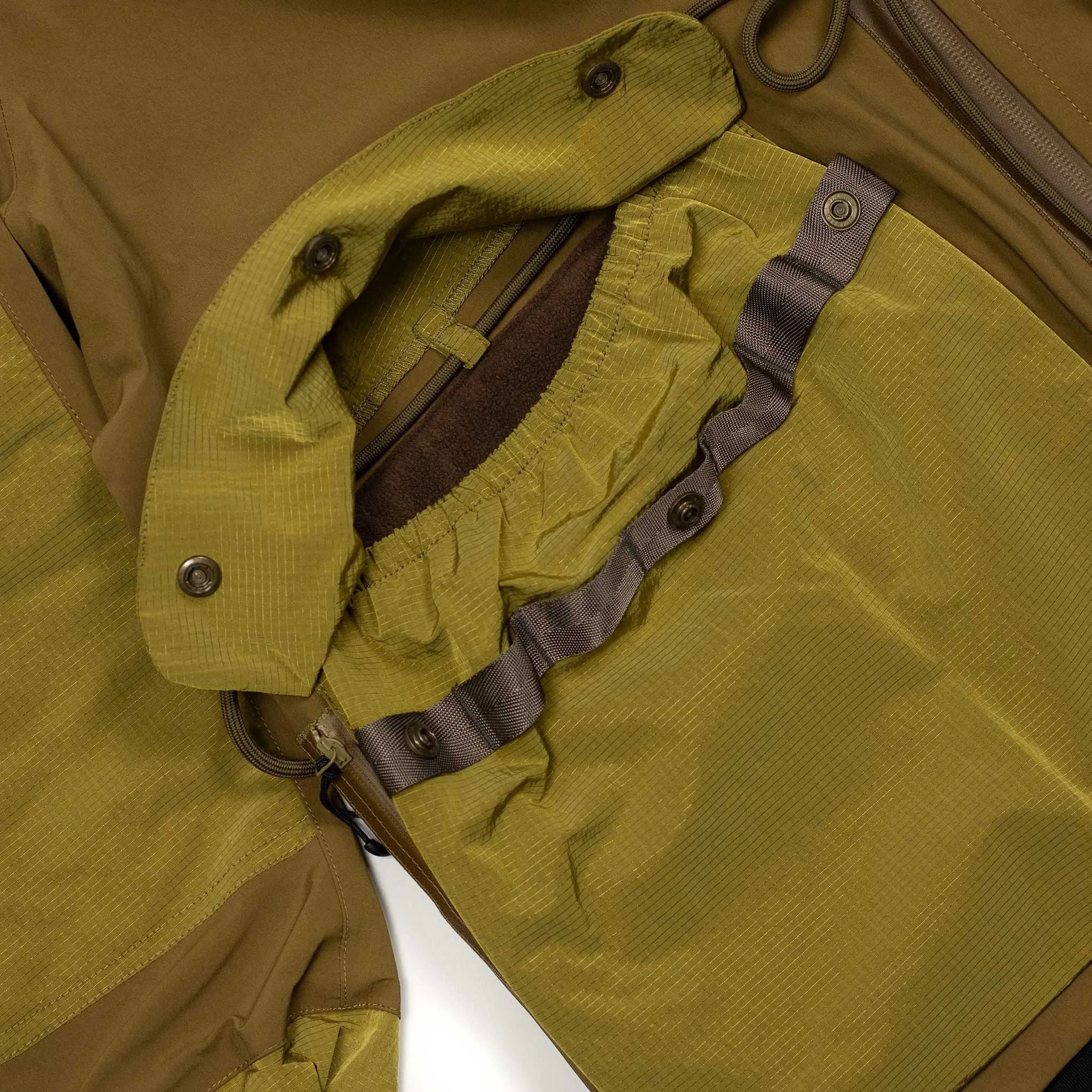 All-weather shell jacket in coyote brown and green nylon