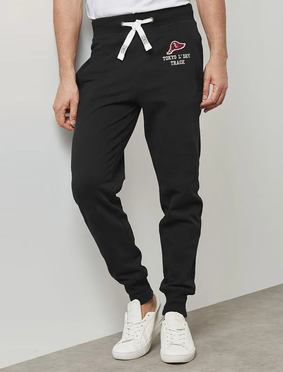 Pollow Brushback Fleece Cuffed Joggers in Jet Black - Tokyo Laundry